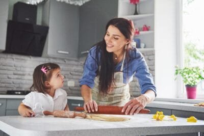 mother daughter cooking together